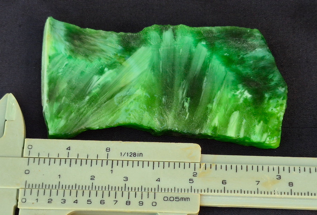 Green chatoyant glass slab 47g - flat lay with ruler