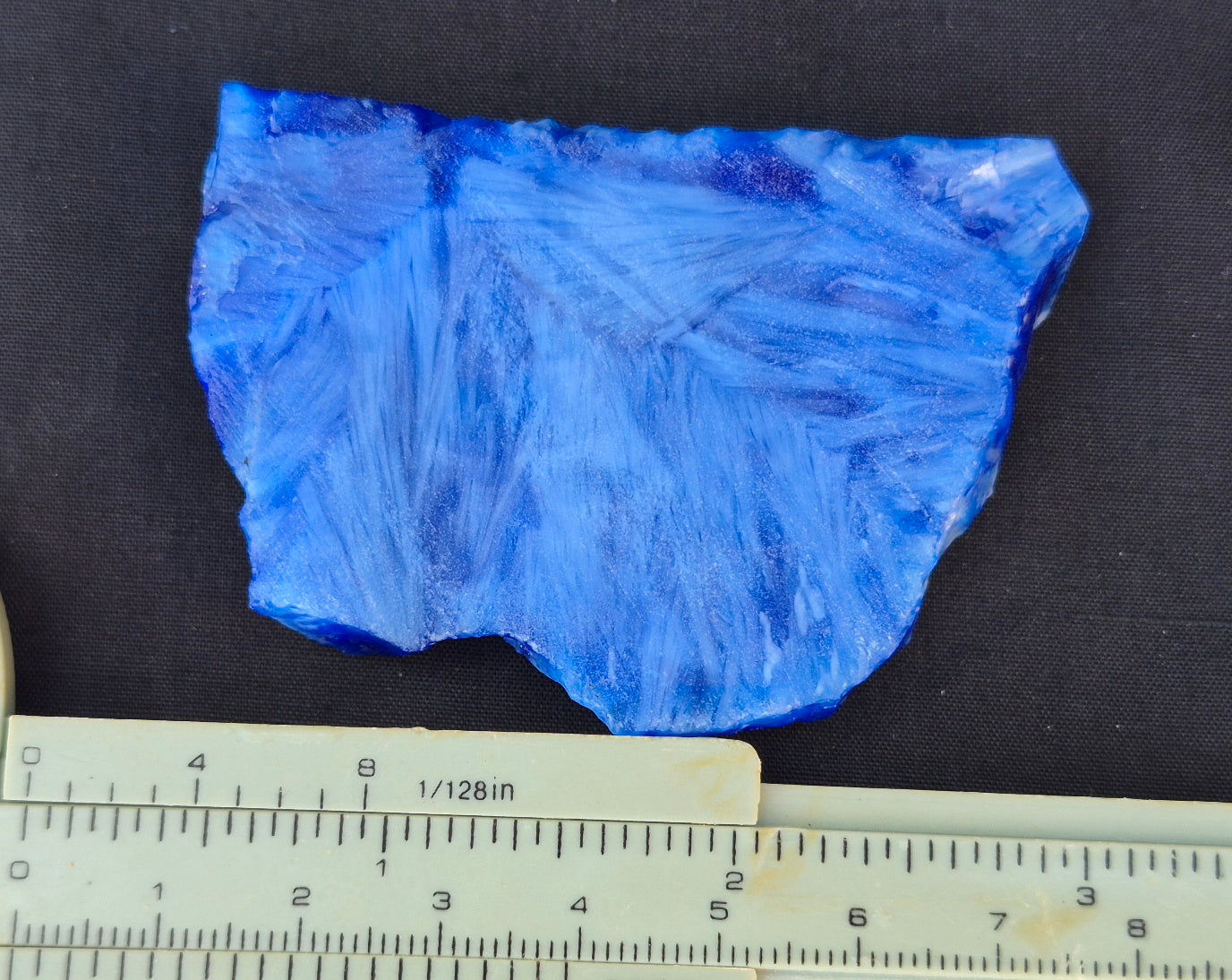 Blue chatoyant glass slab 42g - flat lay with ruler