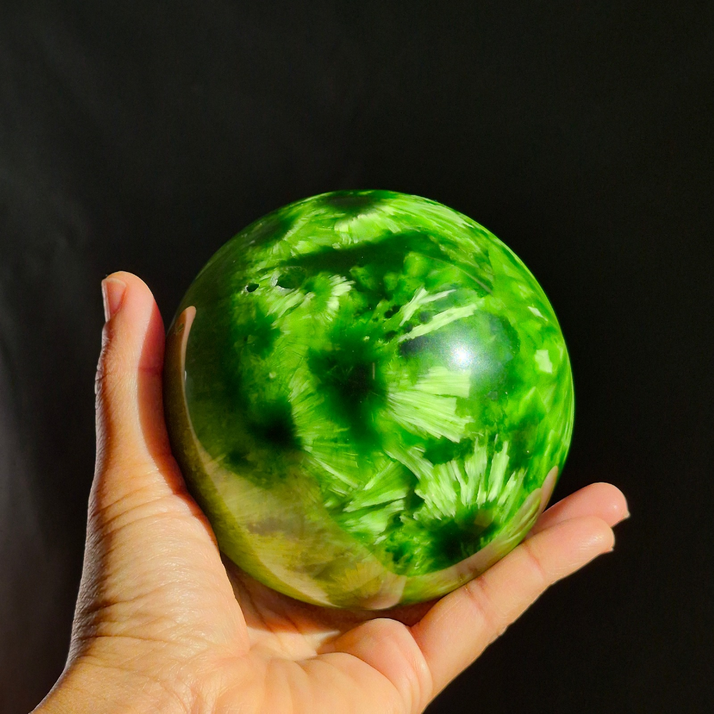 Starburst Glass Sphere Forest Green with ruler showing 100mm diameter