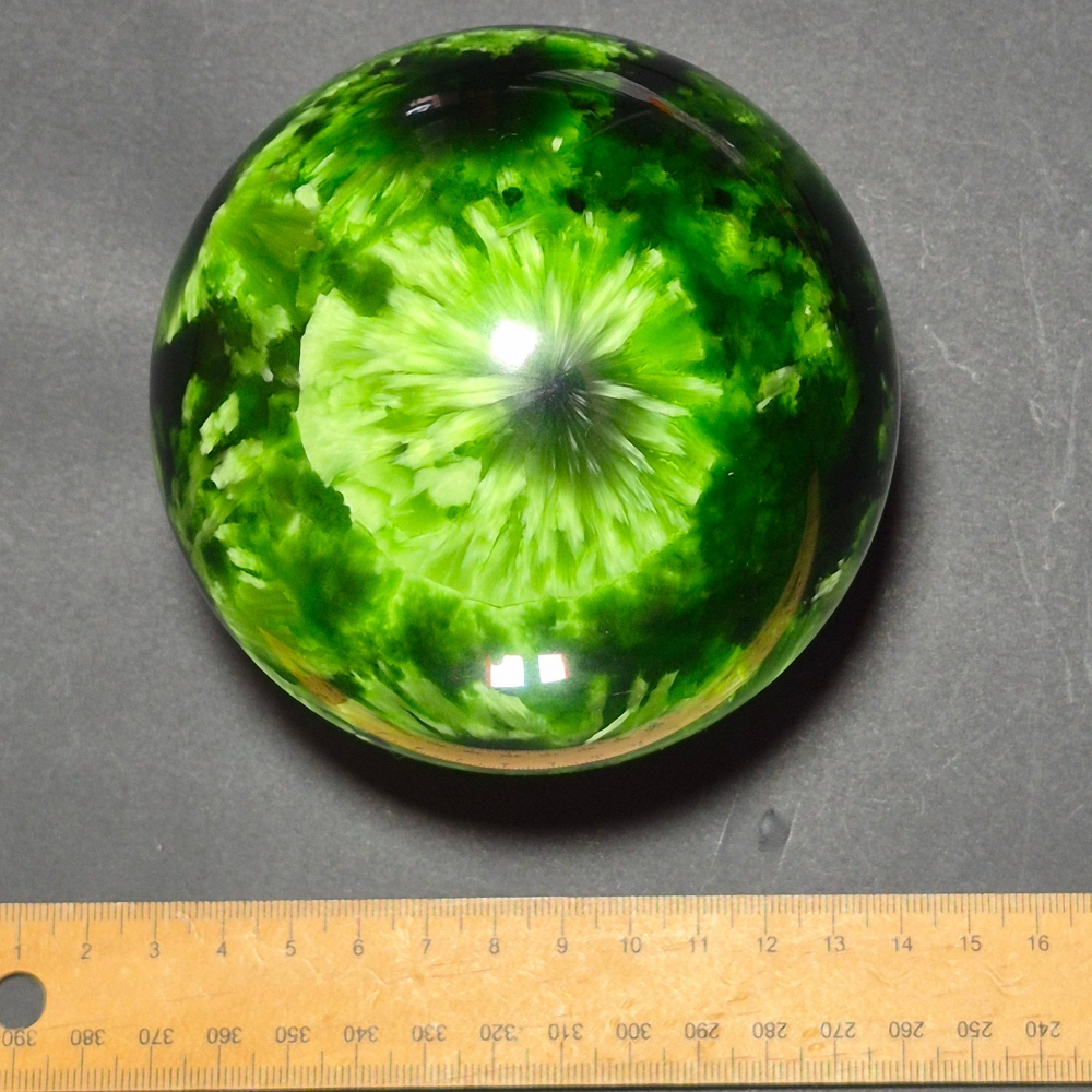 Starburst Glass Sphere Forest Green held in hand, view 2
